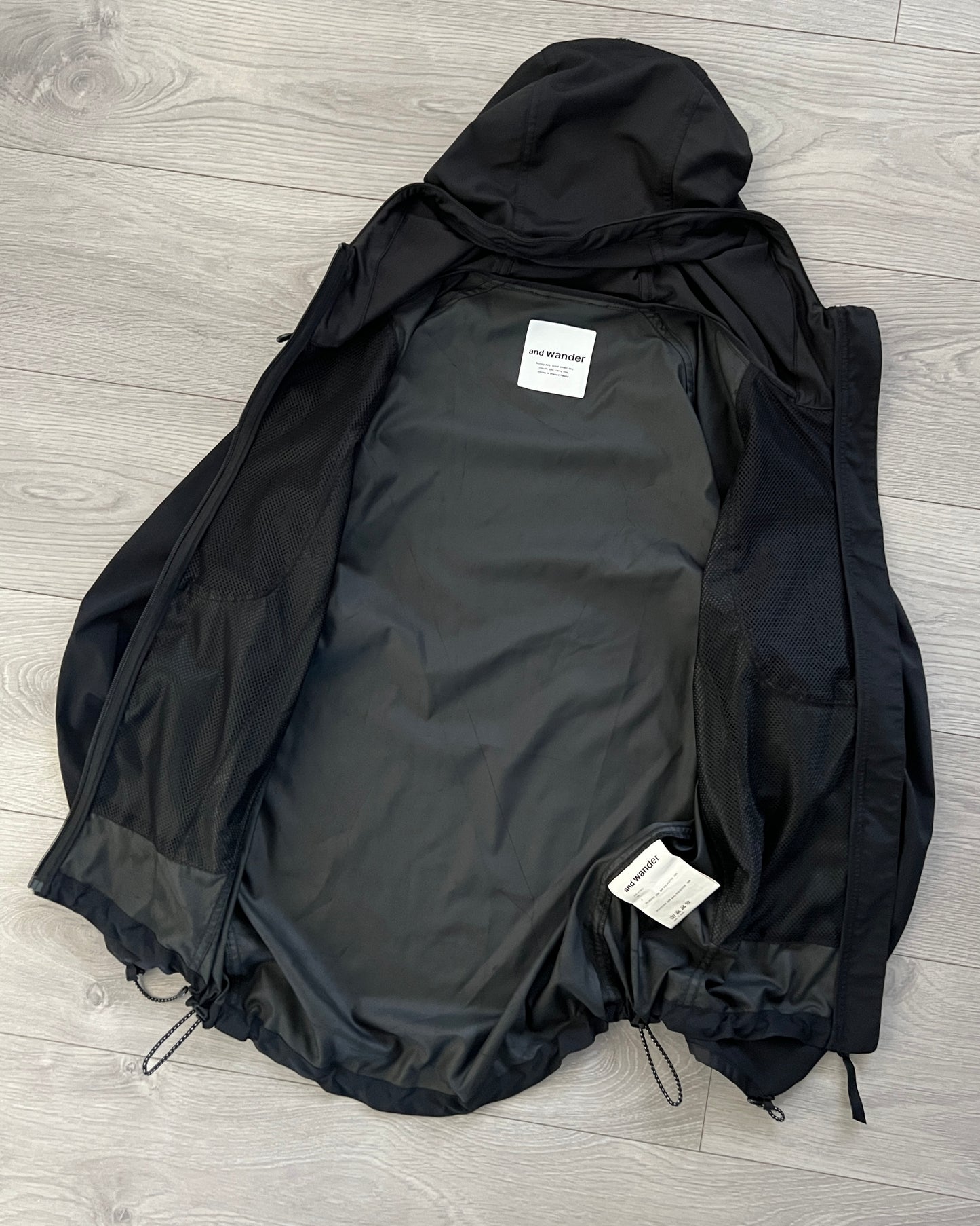 And Wander Technical Windproof Water Repellent Reflective Jacket - Size M