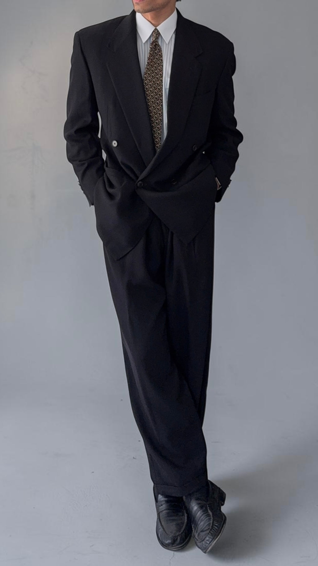 Versace 1980s Notch Lapel Double Breasted Wool Pleated Black Textured Suit - Size M Jacket / 30" Waist