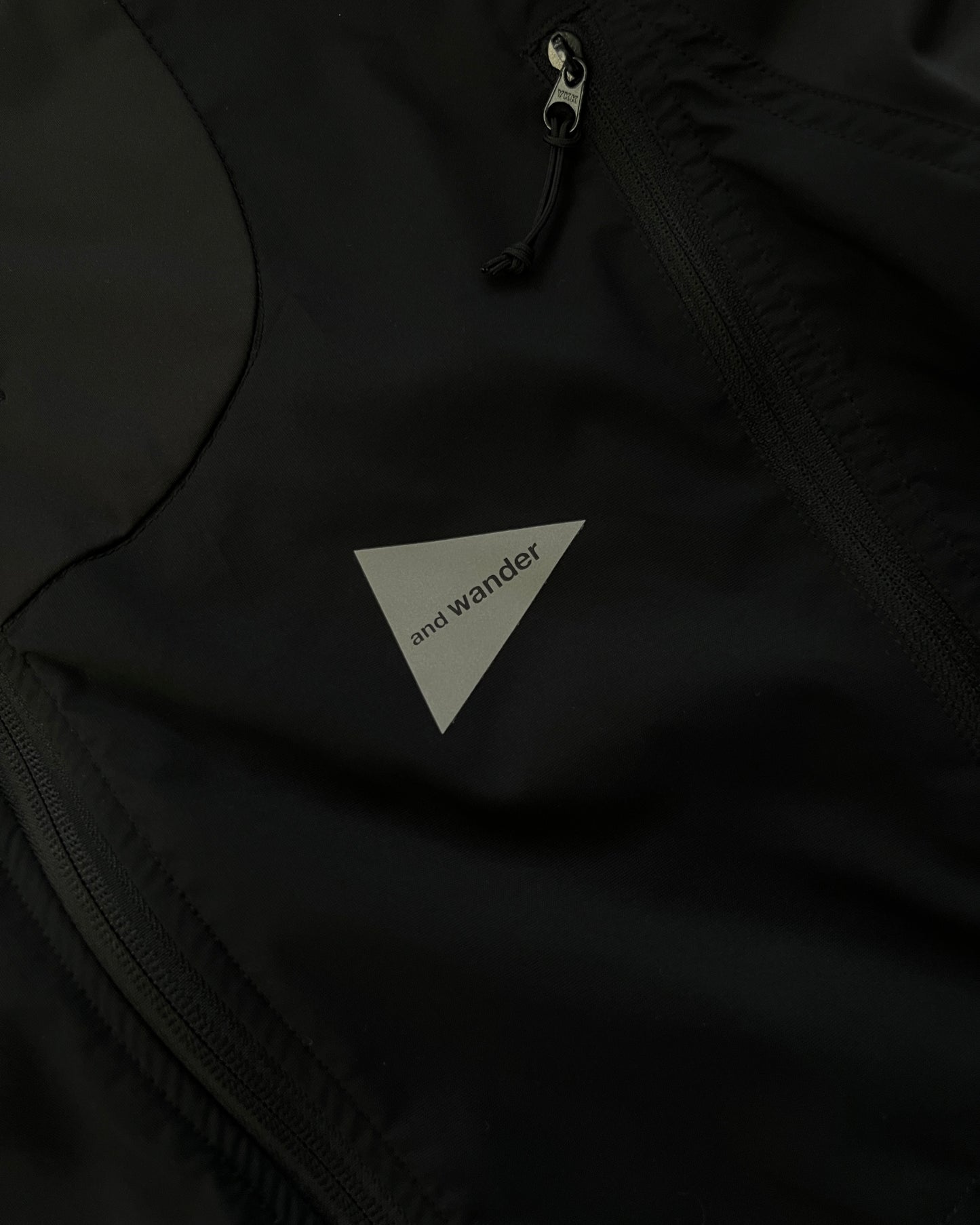 And Wander Technical Windproof Water Repellent Reflective Jacket - Size M
