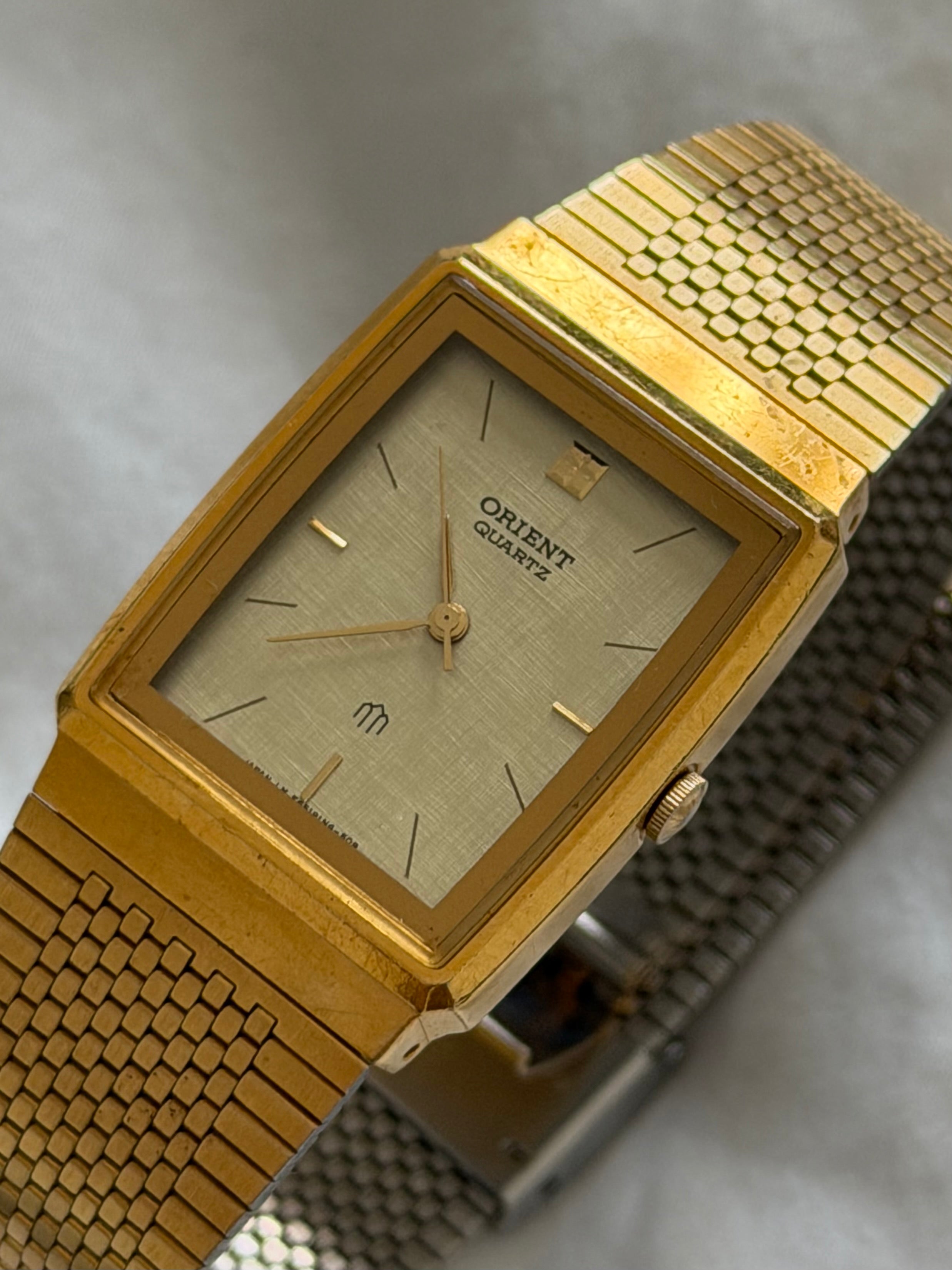Oreint 1990s 20MM Linen Dial Gold Plated Stainless Steel Watch