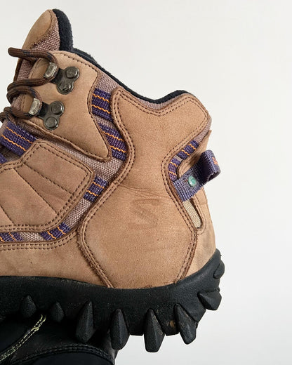 Salomon Early 2000s Vintage Contagrip Rugged Sole Boots - A pair of Salomon boots that have defied time, being more popular now than ever before. The boots feature a suede upper, with contrasting purple groves, a heel tab and boot lock toe. Overall an iconic pair of Salomons great for the outdoors or urban environments