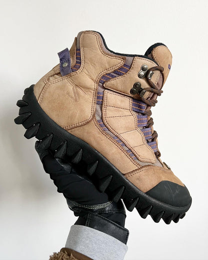 Salomon Early 2000s Vintage Contagrip Rugged Sole Boots - A pair of Salomon boots that have defied time, being more popular now than ever before. The boots feature a suede upper, with contrasting purple groves, a heel tab and boot lock toe. Overall an iconic pair of Salomons great for the outdoors or urban environments